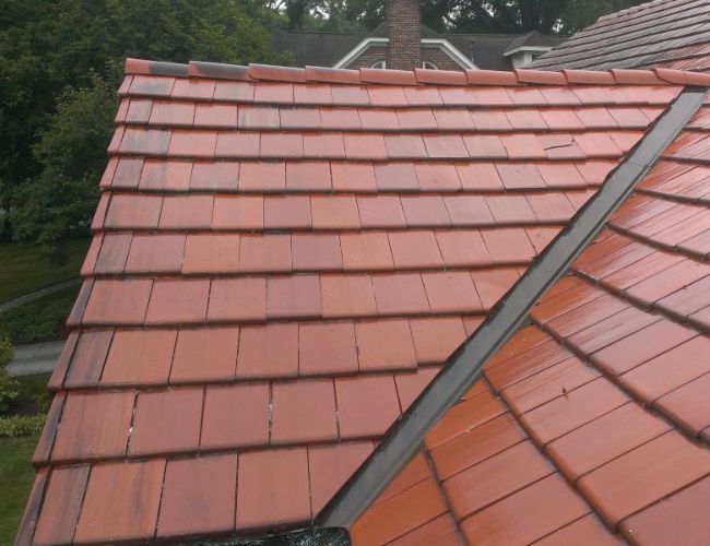 Your roof will look new again after roof washing.