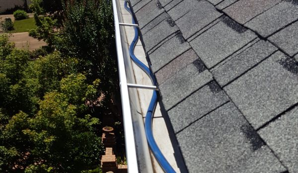 Before Raindrop gutter guards are installed on a homes gutter system.