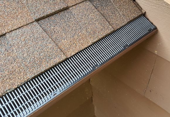 Custom fit Raindrop gutters on a home.