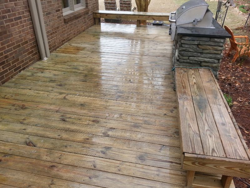 A freshly cleaned wood deck that's ready for a coat of stain.