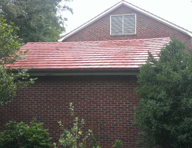 Stunning results after roof cleaning by Precision Pro Wash.