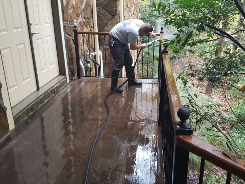 Attention to detail on a wood deck cleaning job.