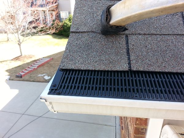 Raindrop gutters installed with Precision.