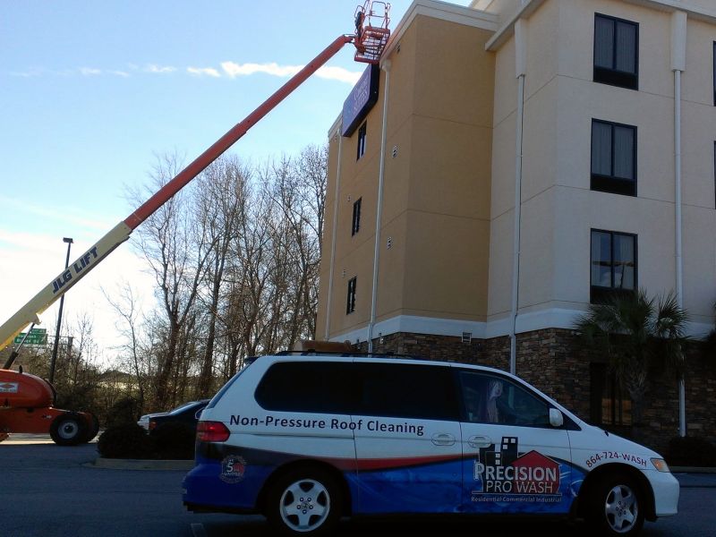 The Precision Pro Wash Manager vehicle on a large hotel pressure washing job.